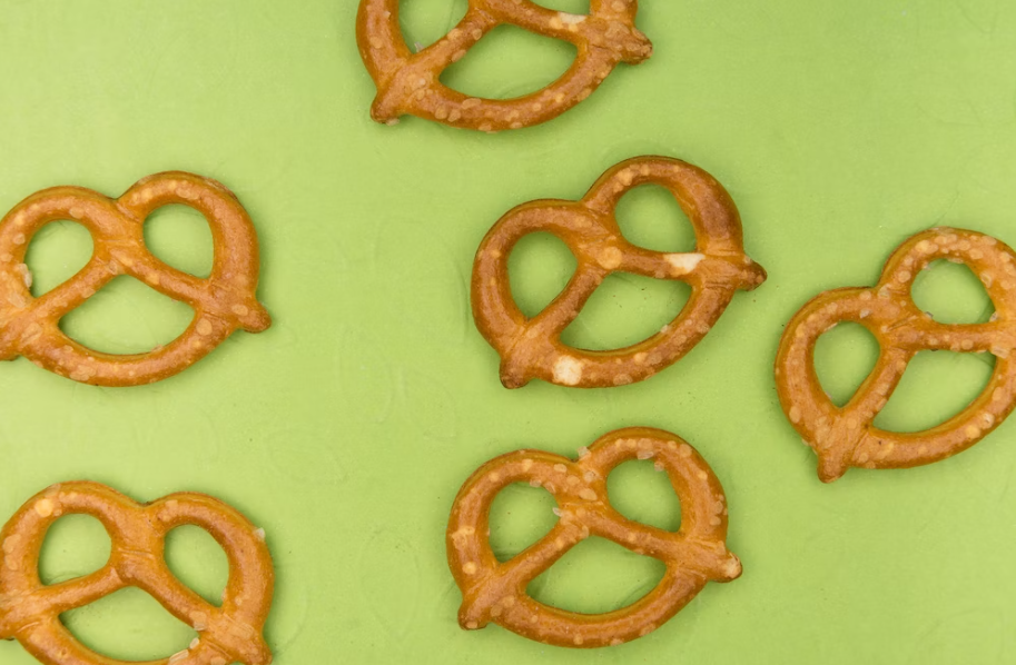 Many pretzels on a green background