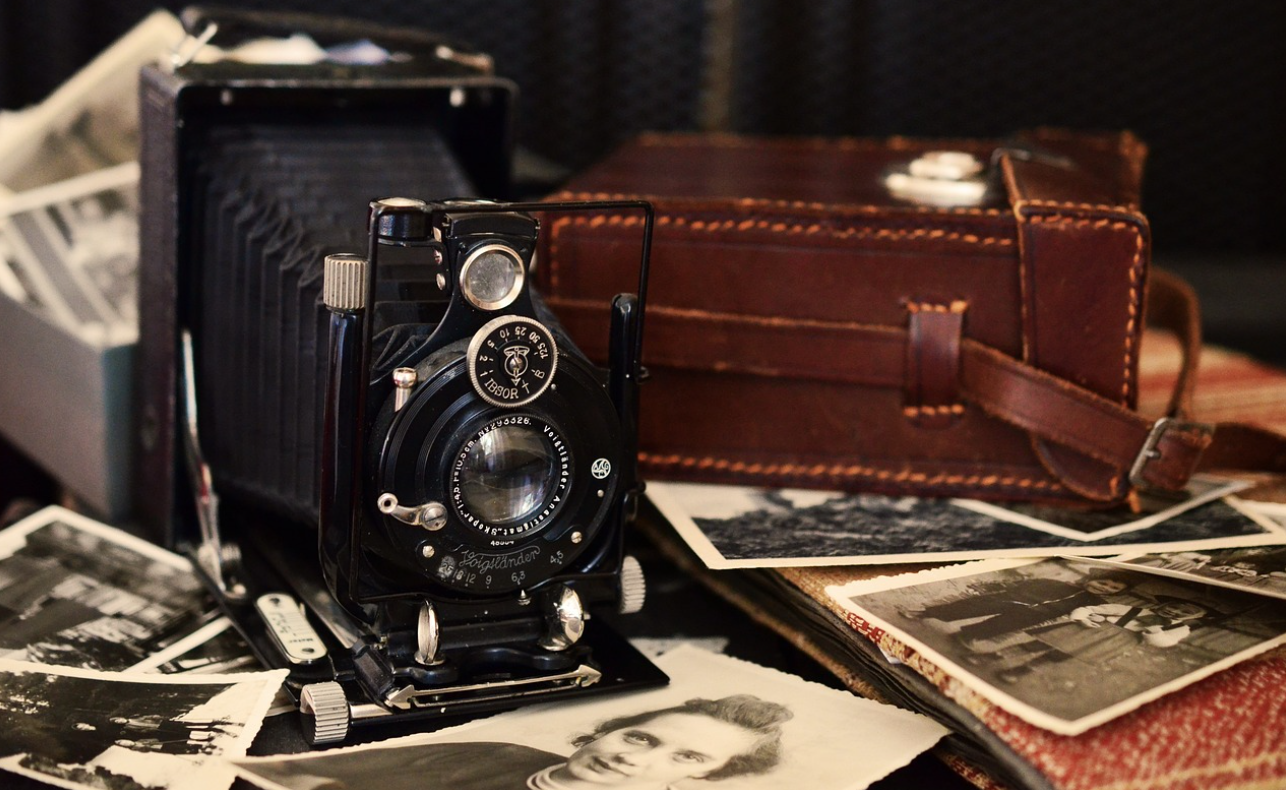 Old camera with black and white pictures.