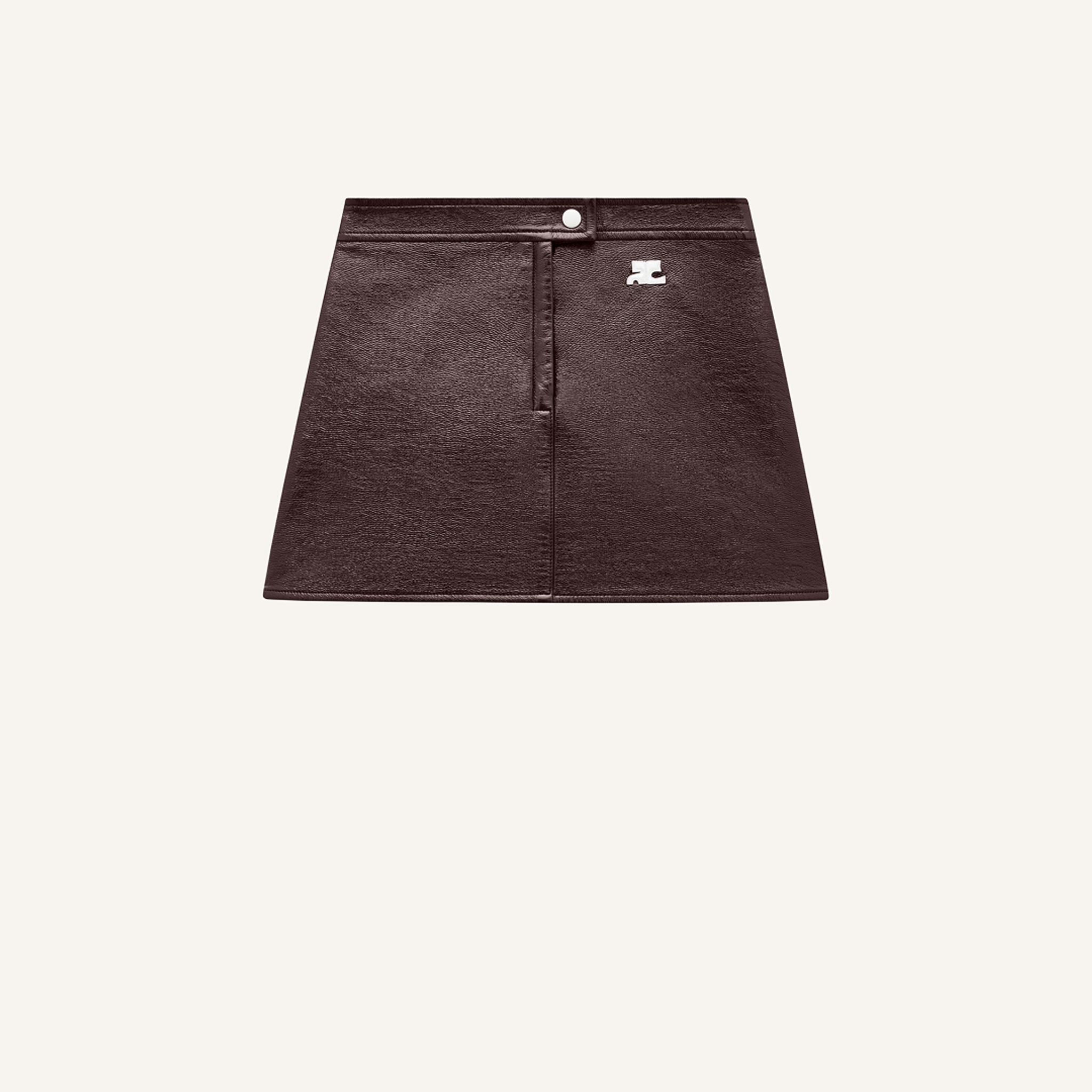 Elegant dark leather mini skirt with silver logo detail, perfect for Courrèges fashion style.