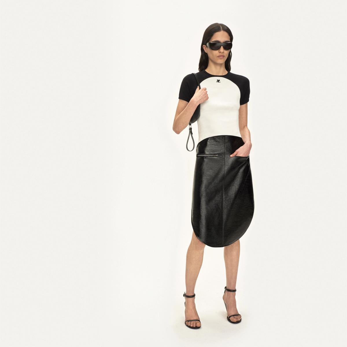 Elegant satin slip dress by Courrèges featuring delicate lace accents, perfect for chic styling.