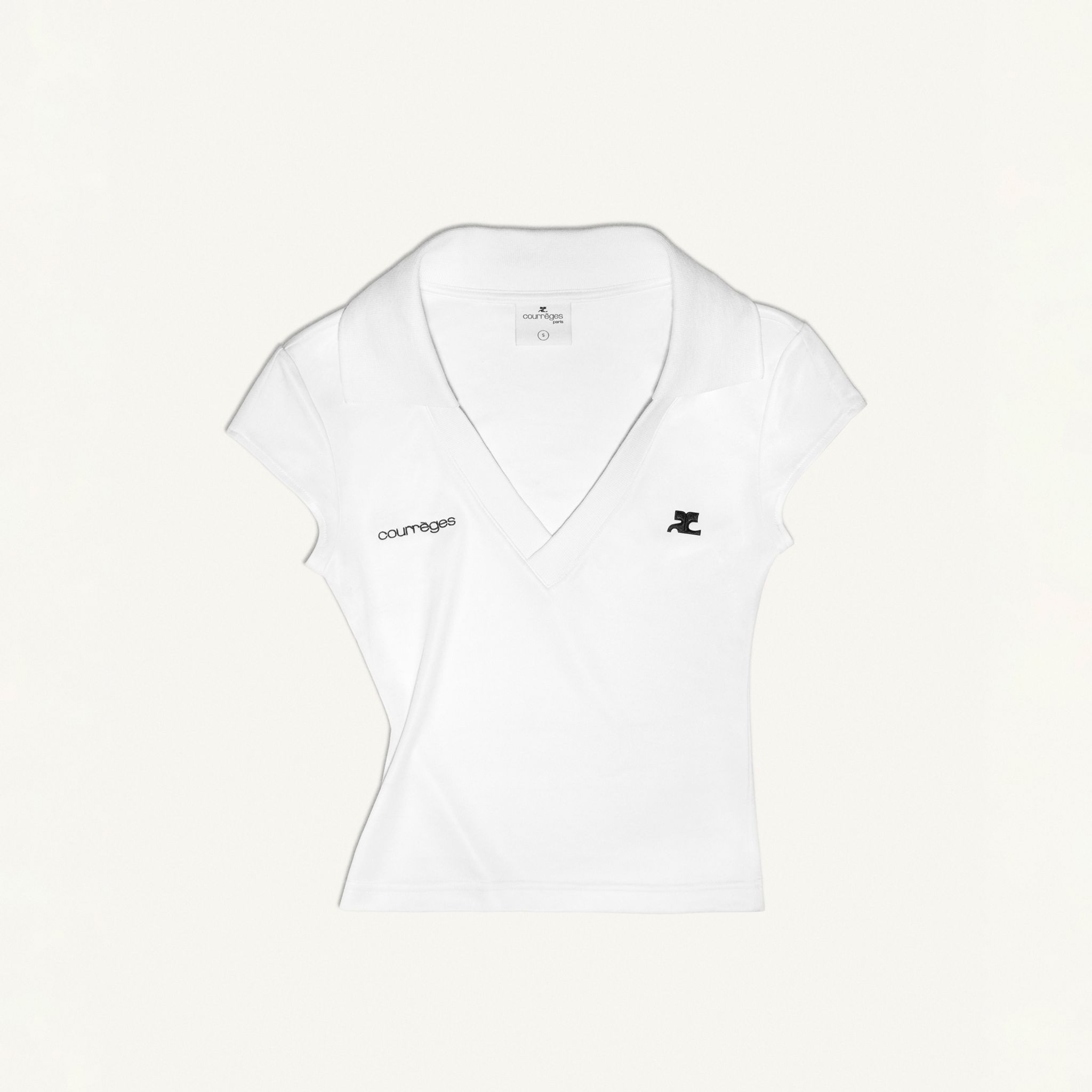 Elegant white V-neck top with Courrèges logo, iconic for a modern fashion statement.