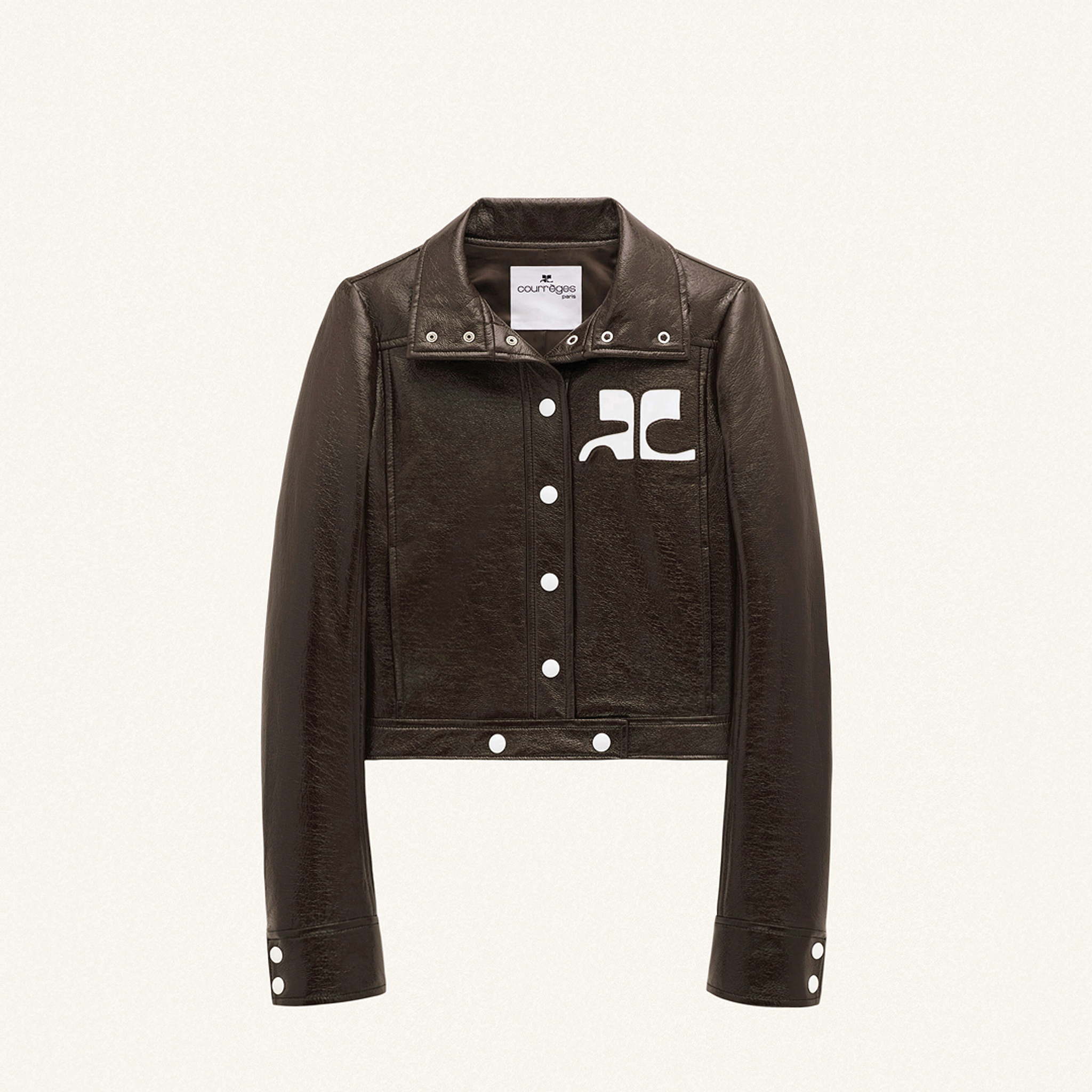 Elegant black leather cropped jacket with white logos, ideal for Courrèges fashion style.