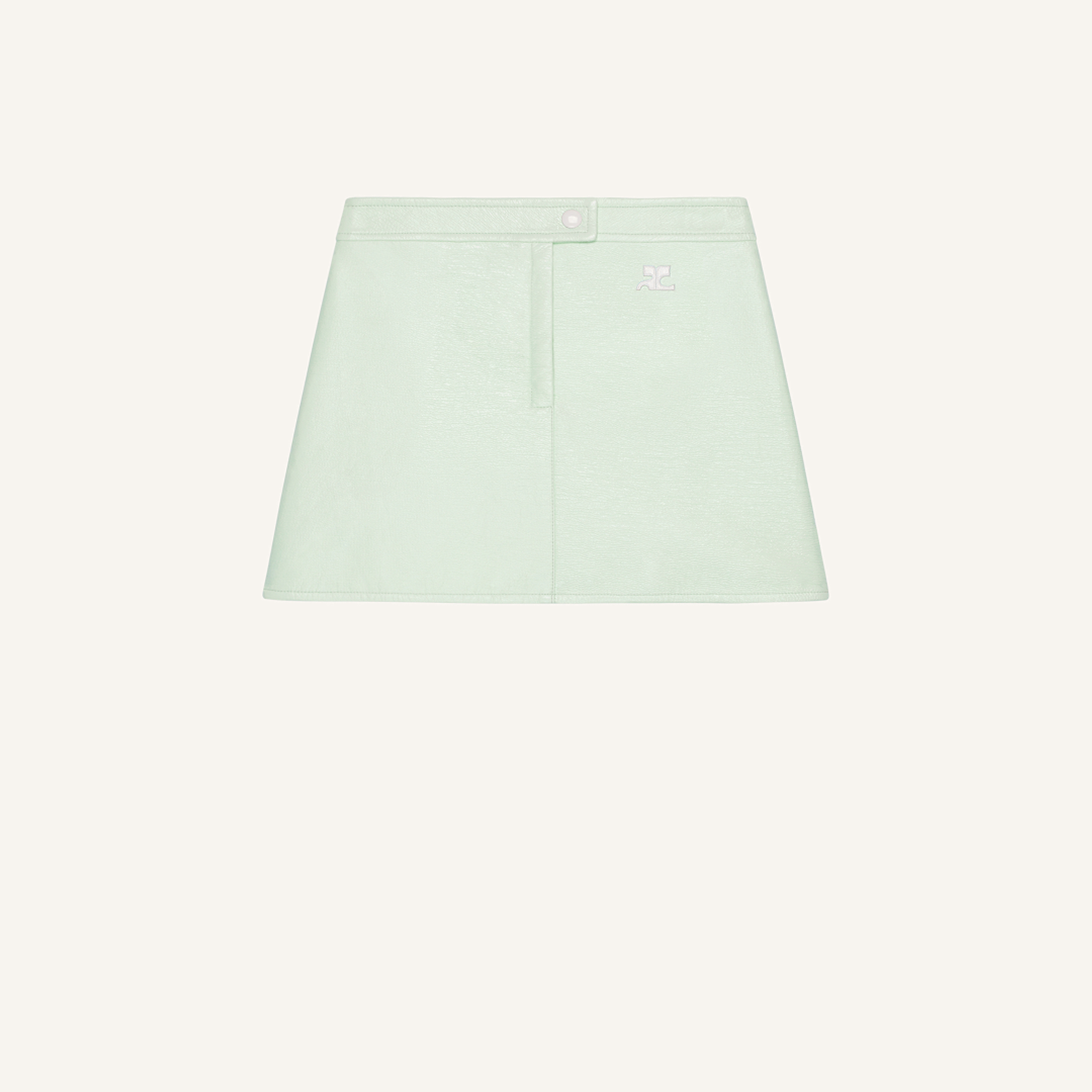 Elegant mint green Courrèges mini skirt displayed on an ecommerce site for fashion lovers.