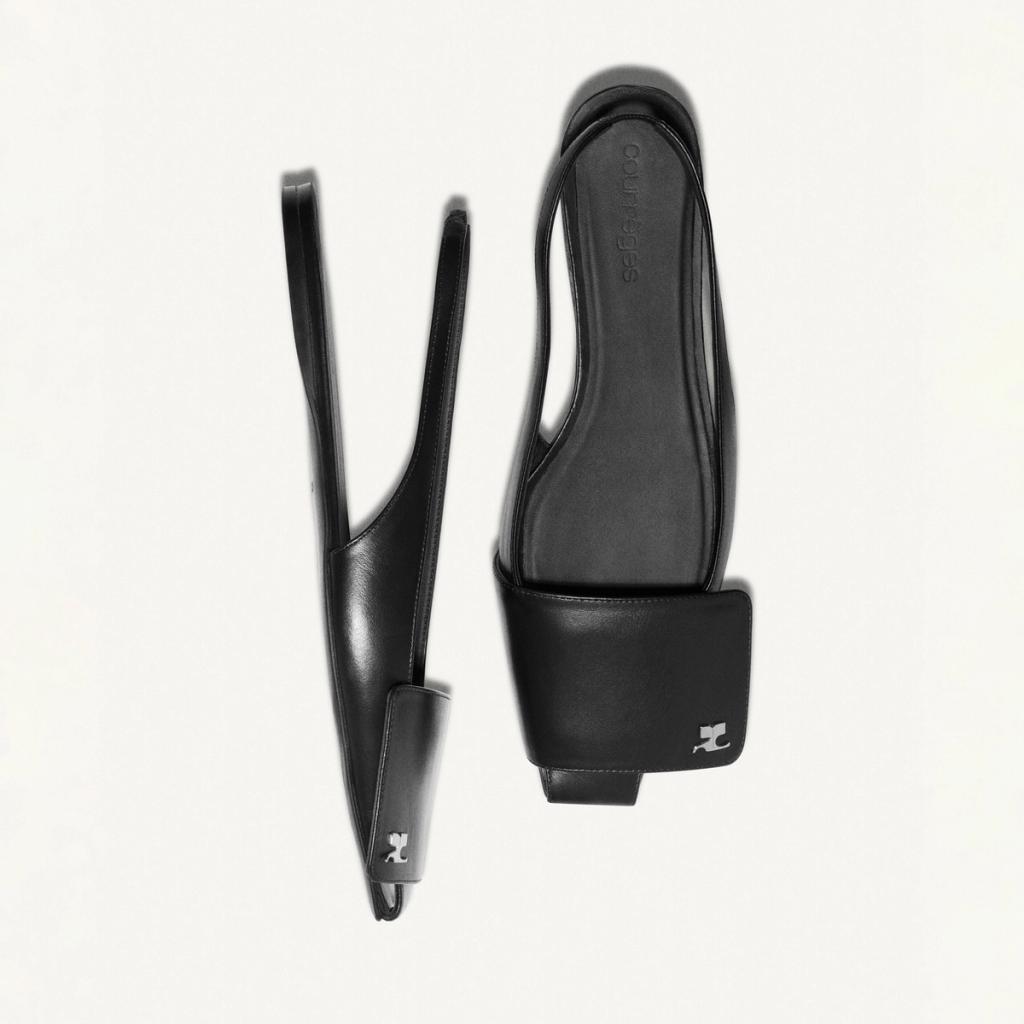 Elegant black leather sandals with a sleek design, featured on Courrèges' fashion e-commerce site.