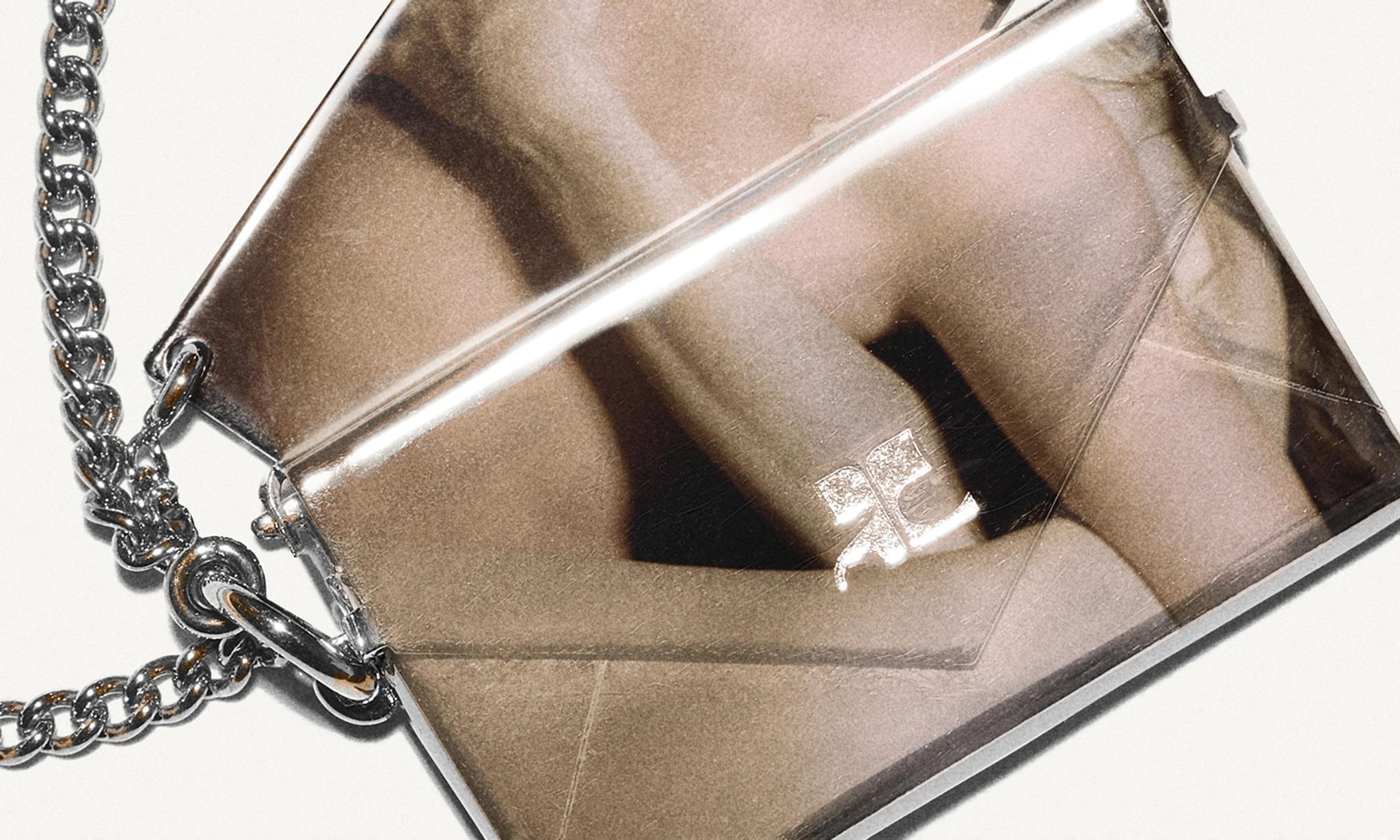 Elegant metallic clutch with chain strap, ideal for Courrèges fashion accessories and evening style.