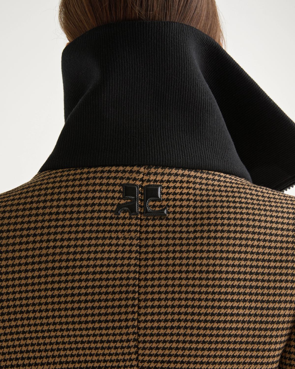 Elegant brown houndstooth coat with black accents, stylish for Courrèges fashion website.