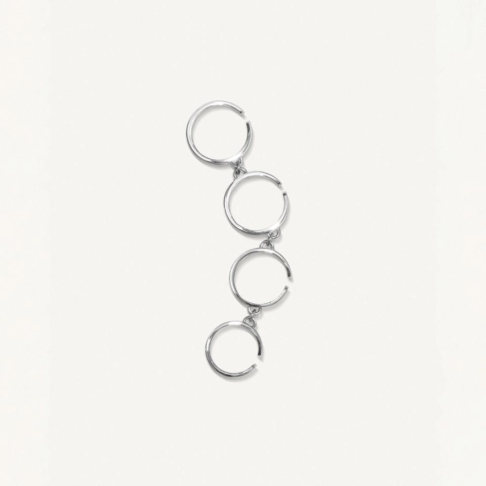 Elegant silver hoop earrings featured on Courrèges fashion ecommerce site for modern style.