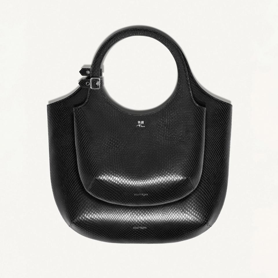 Elegant black leather tote bag featuring Courrèges branding, perfect for fashion enthusiasts.