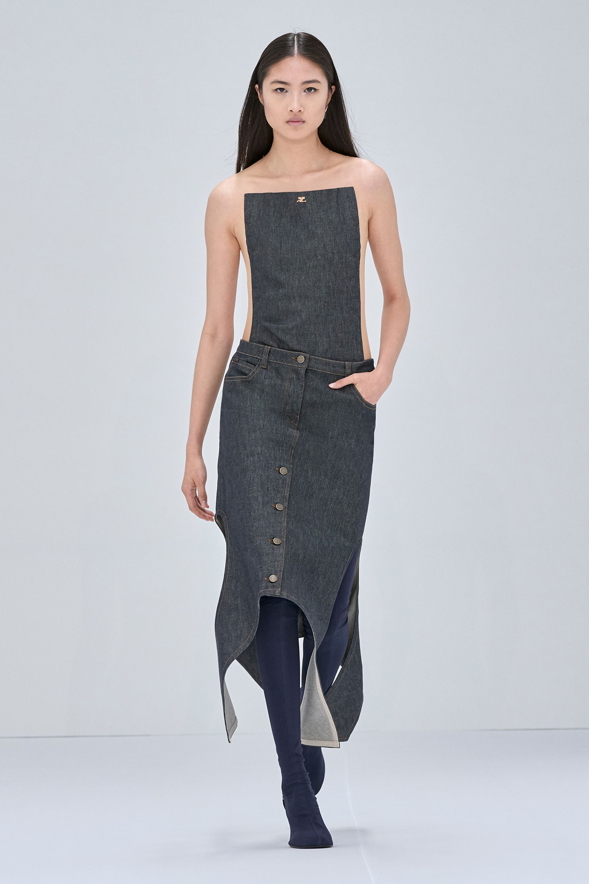 Elegant denim dress in monochrome style with button details, perfect for Courrèges fashion.