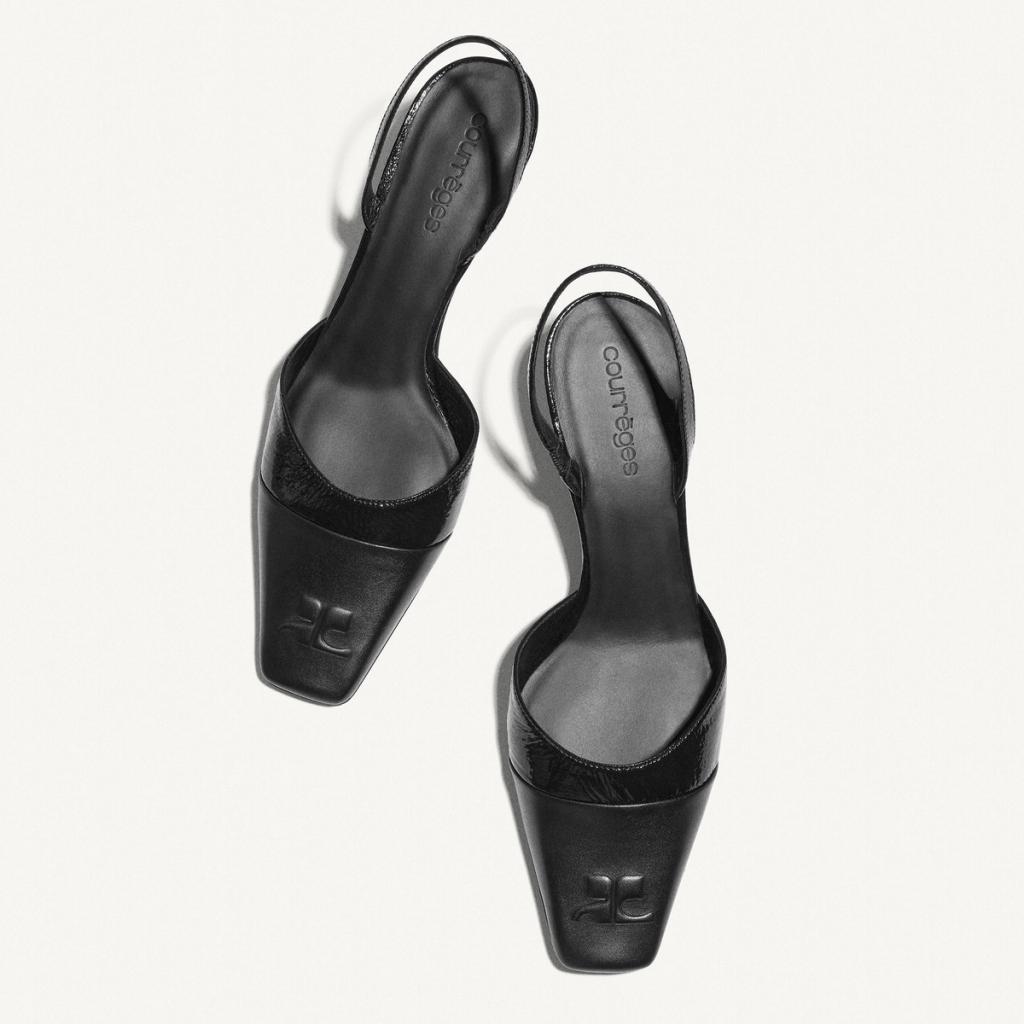 Elegant black Courrèges high-heeled shoes with a sleek modern design for fashion lovers.