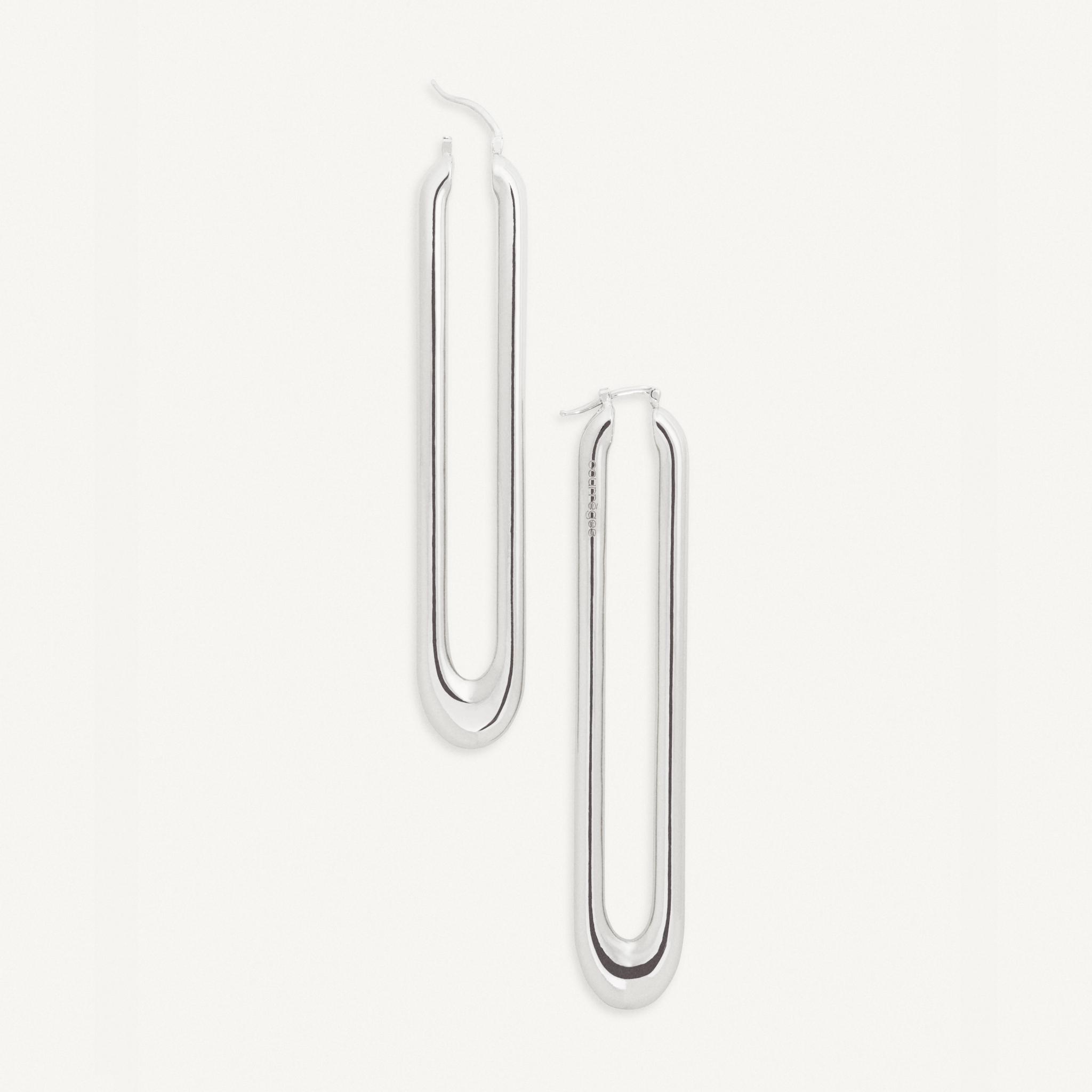 Elegant silver jewelry by Courrèges, minimalistic design for modern fashion enthusiasts.