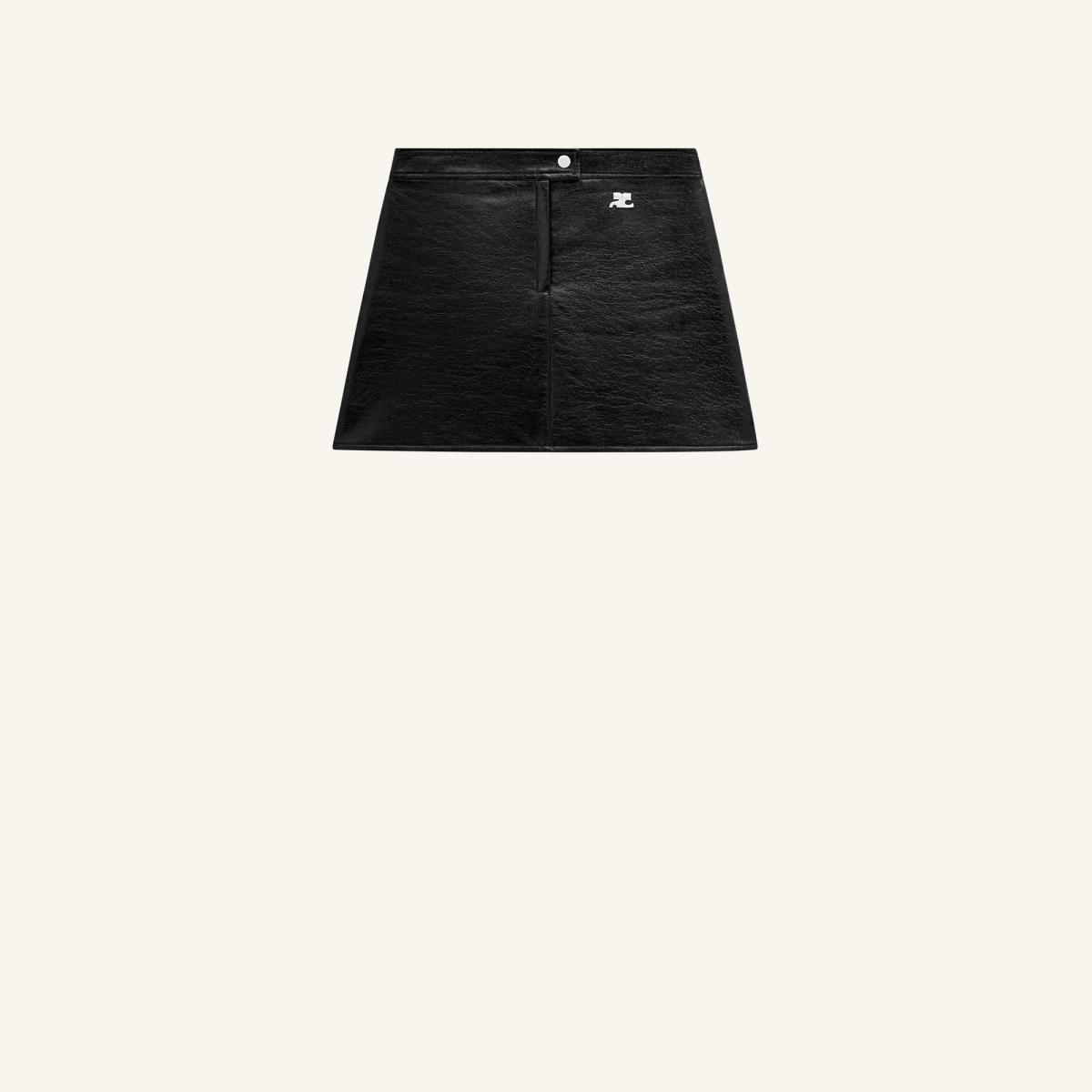Black leather Courrèges mini skirt with silver logo, front zip detail, minimalist white background.