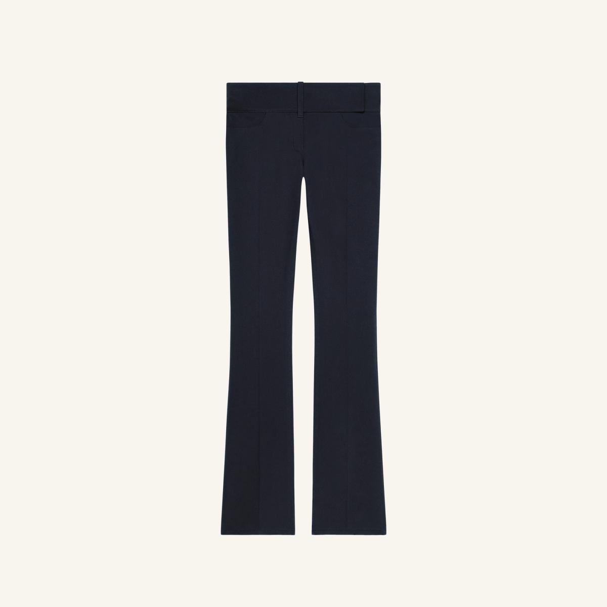 Elegant navy blue tailored flared pants from Courrèges, perfect for sophisticated fashion looks.