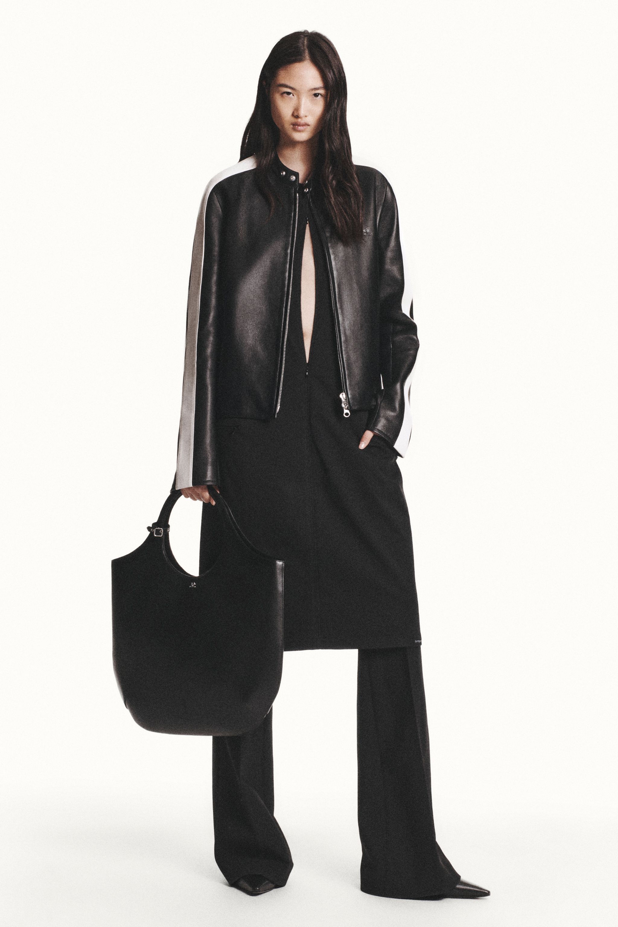 Elegant black leather jacket and trousers from Courrèges for a stylish modern look.