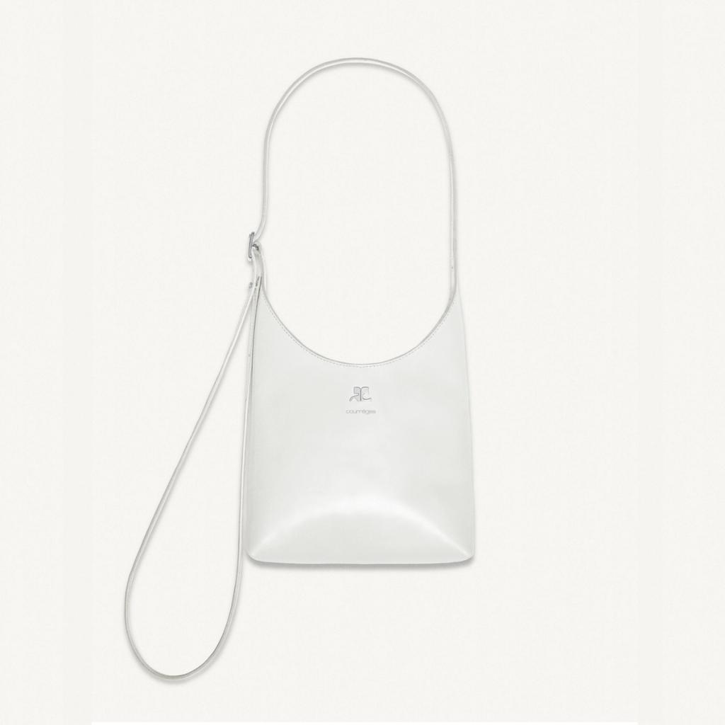 Elegant white Courrèges handbag with sleek design, perfect for modern fashion accessories.
