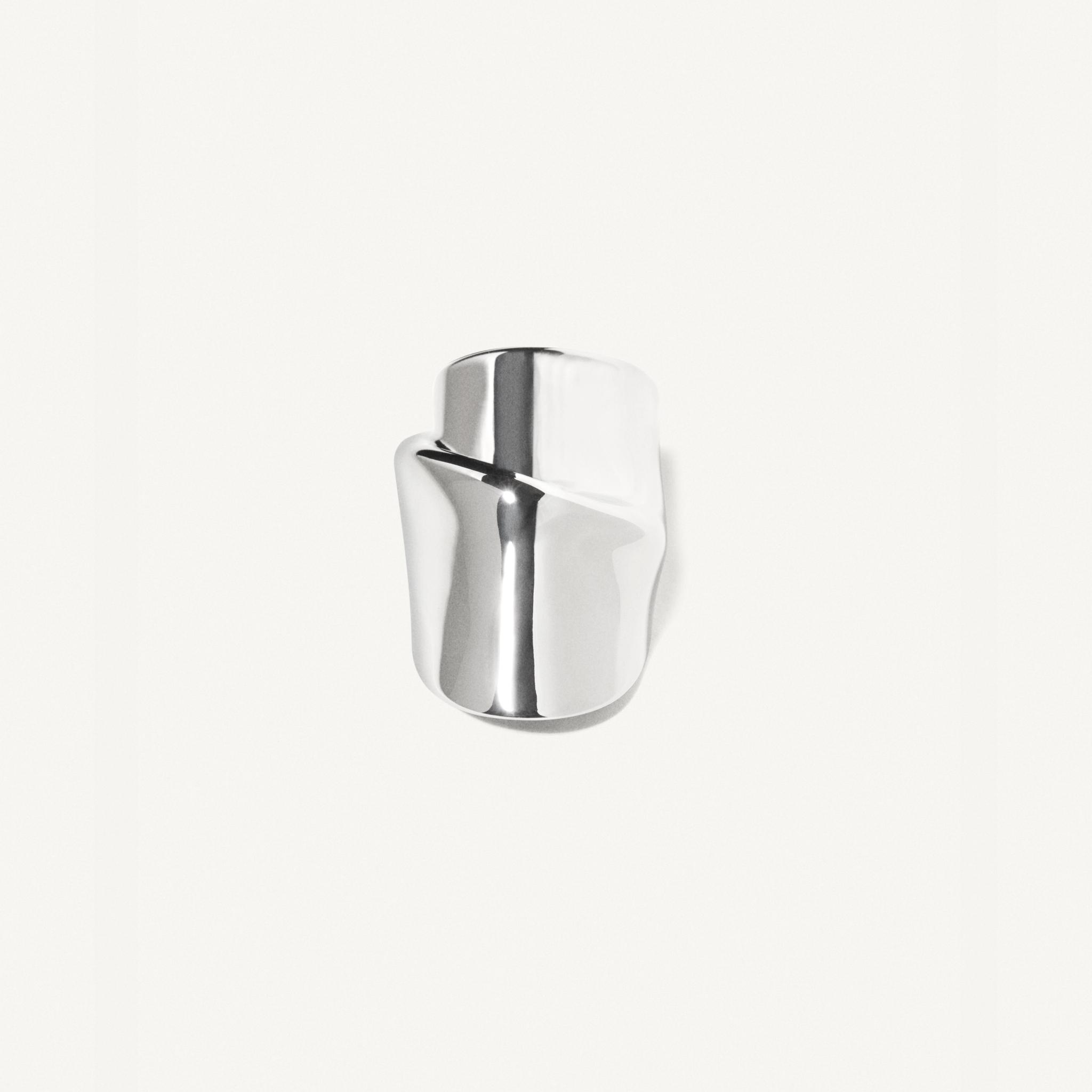 Elegant silver ring by Courrèges, minimalist design for modern fashion enthusiasts.