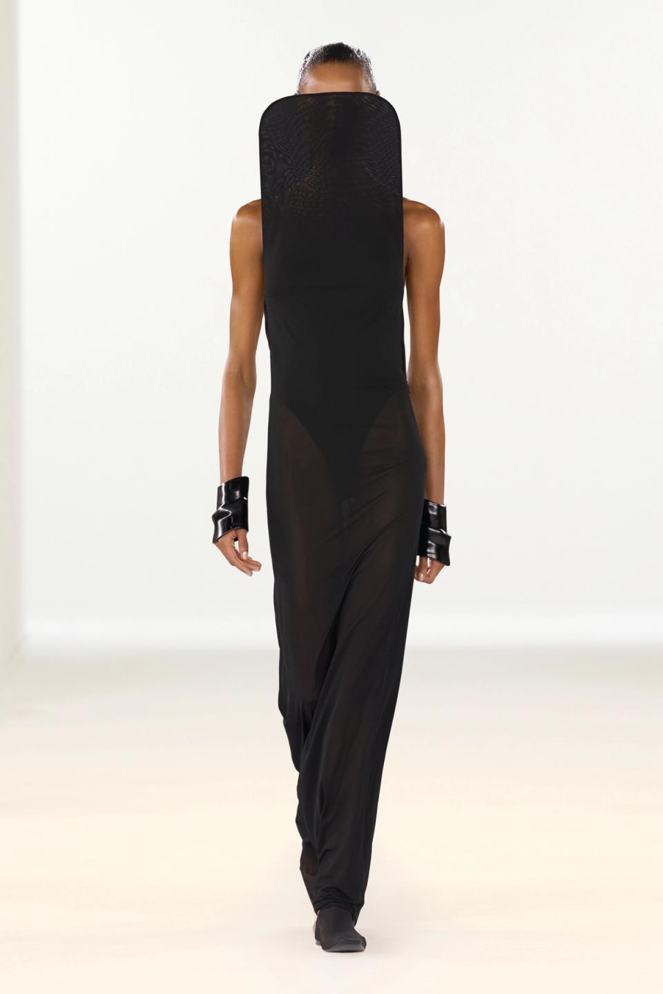 Elegant black dress with a mesh top, part of Courrèges' exclusive fashion collection.