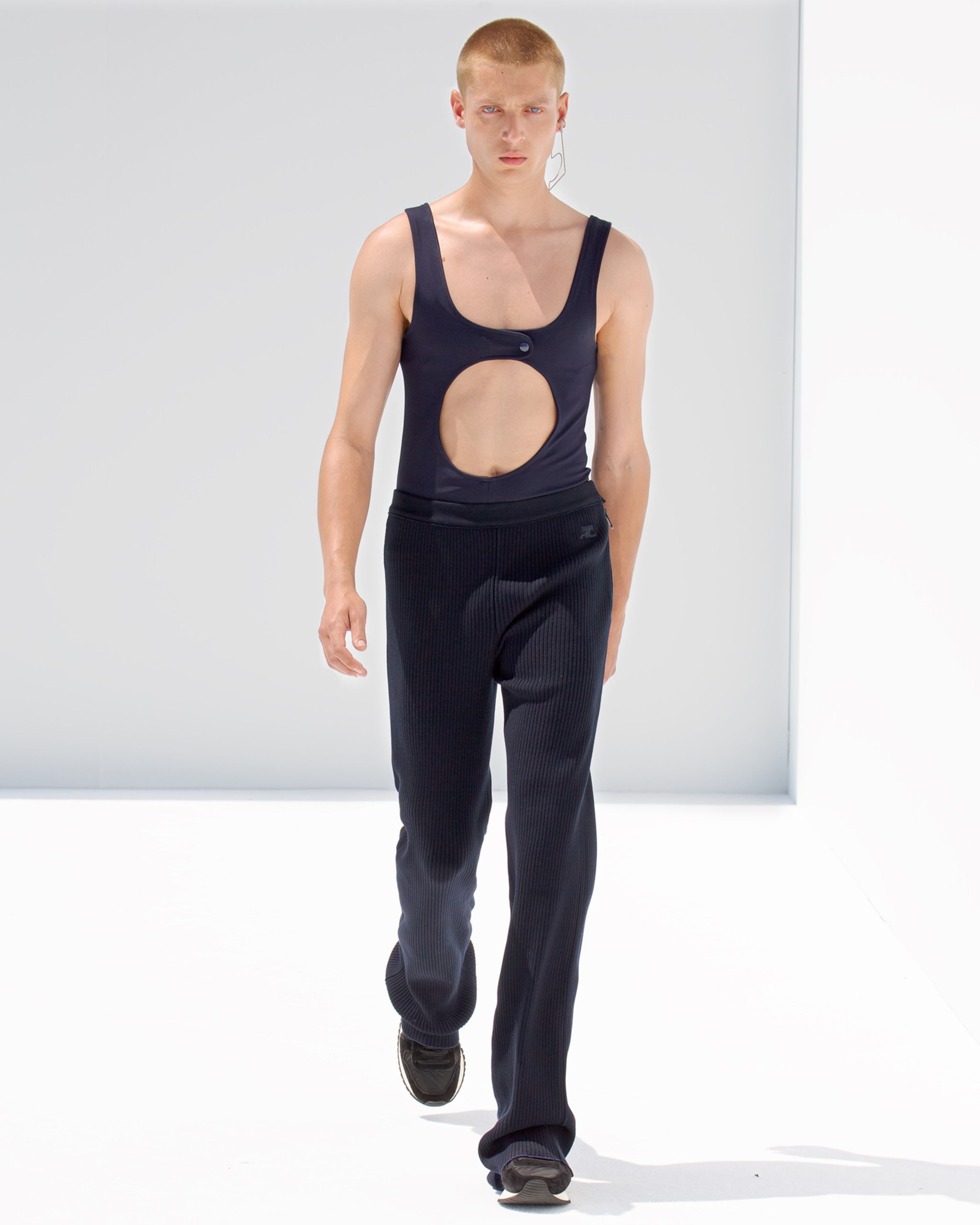 Elegant black cut-out tank top by Courrèges for modern, chic fashion statements.