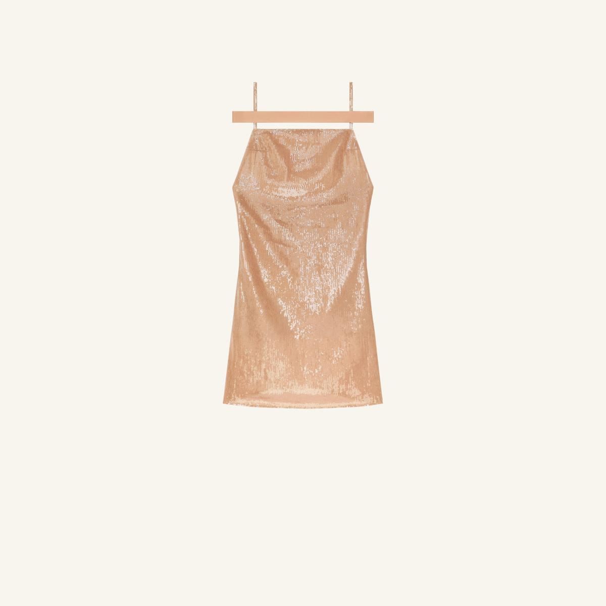 Elegant peach-colored sequin slip dress by Courrèges, showcased on a hanger for online shopping.