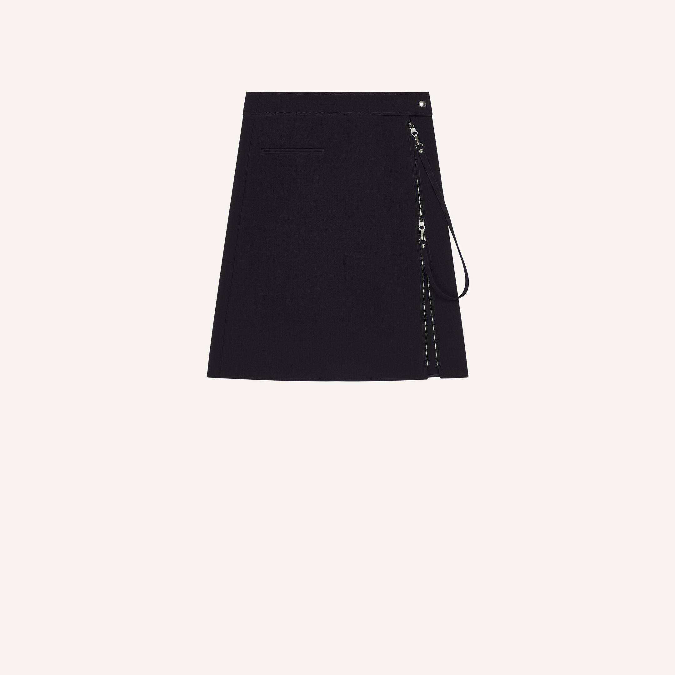 Elegant black Courrèges skirt with subtle zipper details, perfect for modern fashion looks.