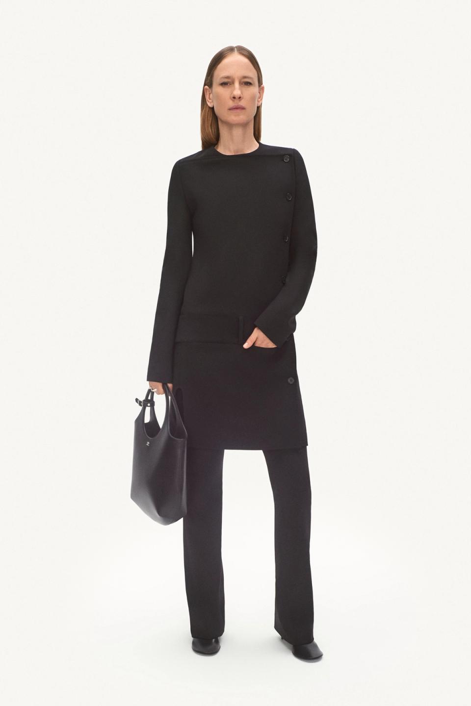 Elegant black tailored outfit with the Courrèges logo, perfect for fashion-forward collections.