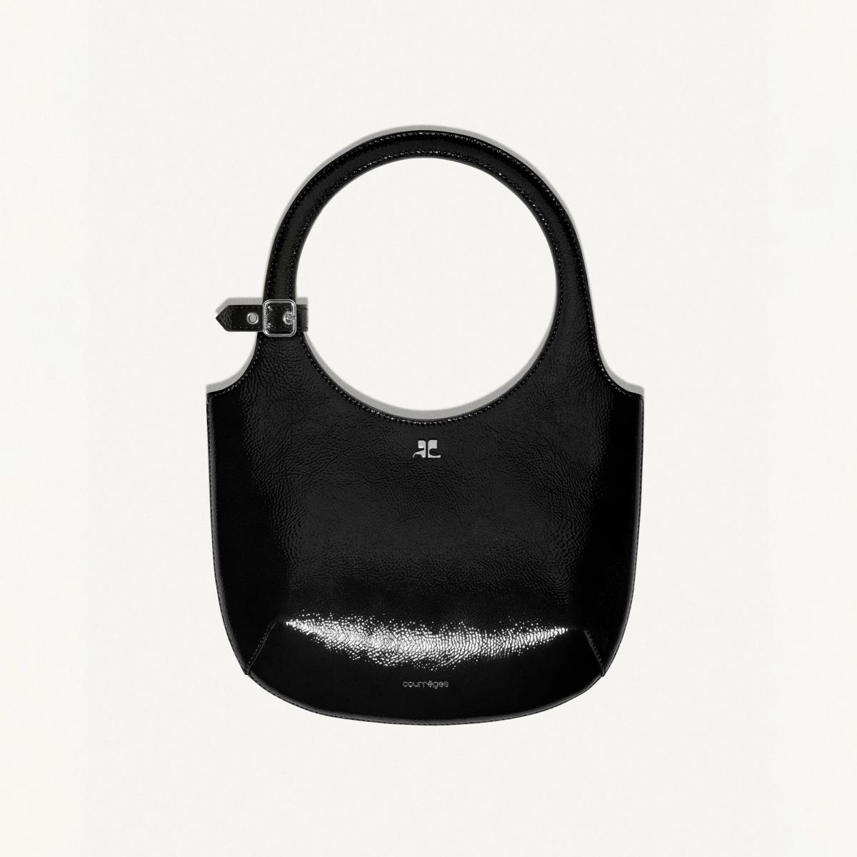 Elegant black Courrèges handbag with a sleek, modern design and distinctive logo, perfect for accessories.