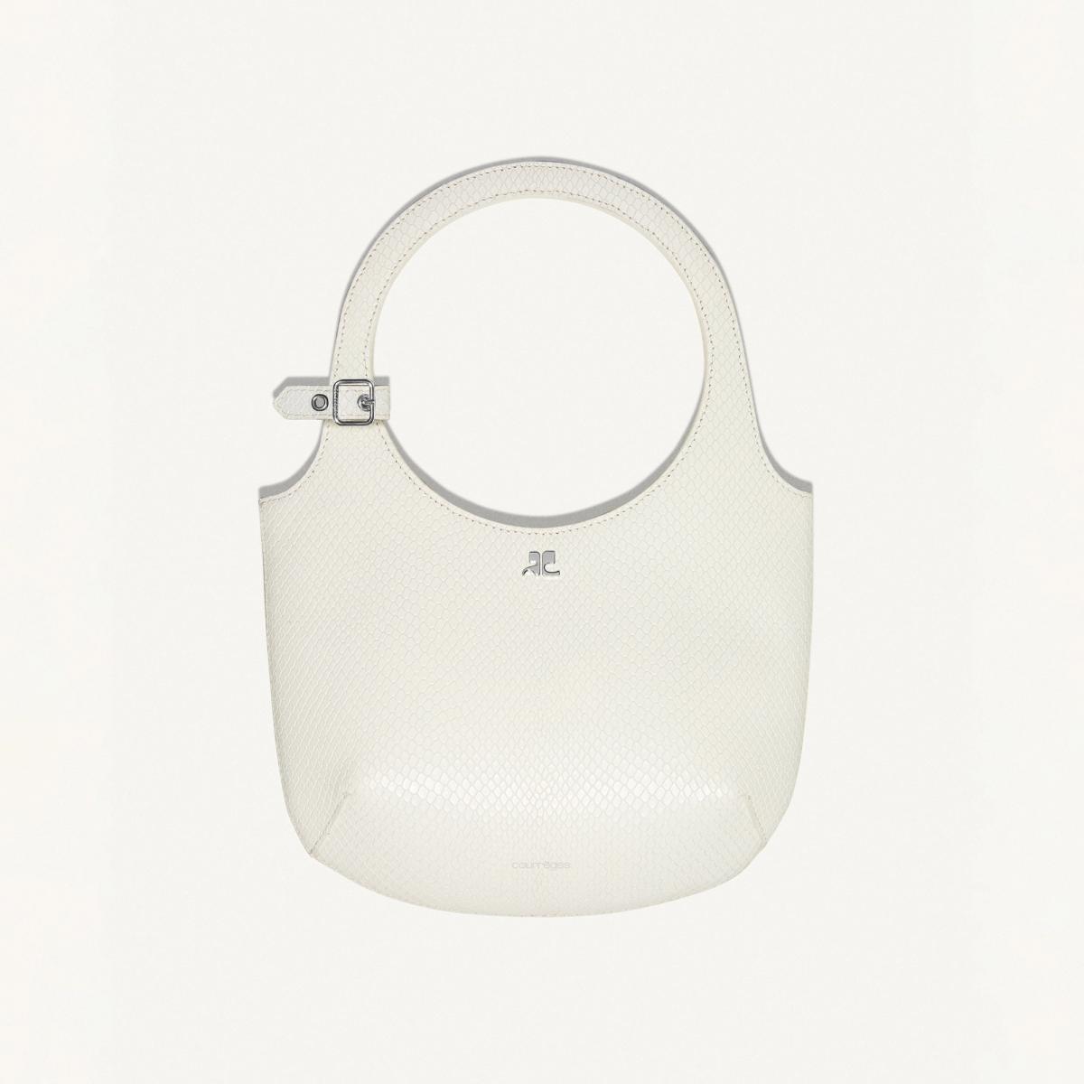 Elegant white clutch bag with textured surface, featuring Courrèges logo, designed for a luxury fashion website.