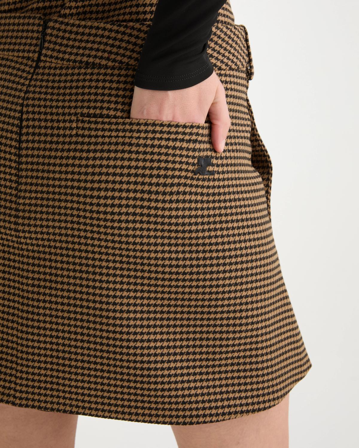 Elegant houndstooth pattern skirt by Courrèges with side pocket, perfect for fashion-forward looks.