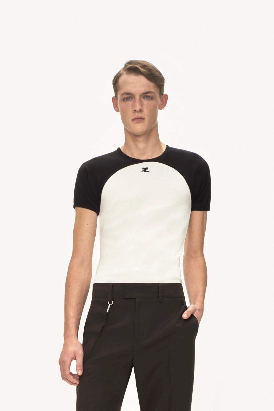 Elegant men's fashion t-shirt by Courrèges, sleek black and white design, perfect for modern style.