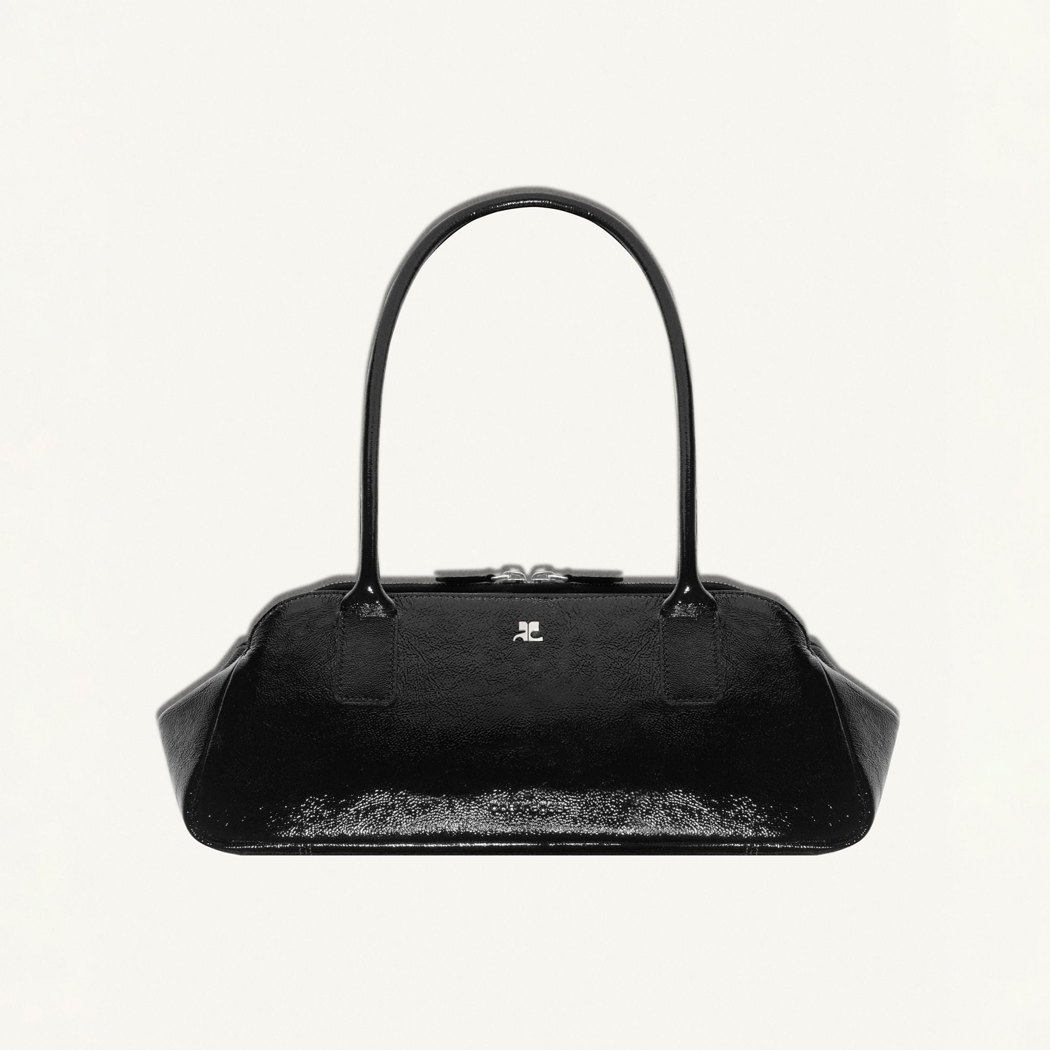 Elegant black leather handbag by Courrèges, sophisticated accessory for fashion-forward looks.