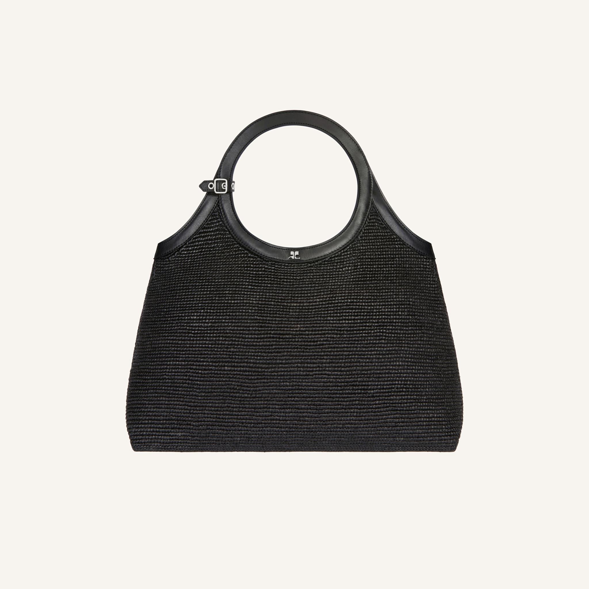 Elegant black handbag with woven texture, perfect for Courrèges fashion collections.