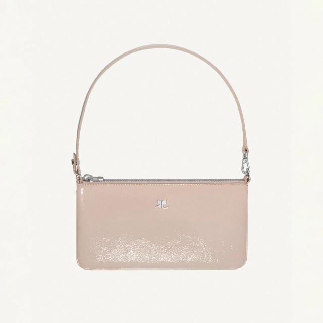 Elegant beige leather handbag with silver accents, displayed on an ecommerce site for Courrèges.