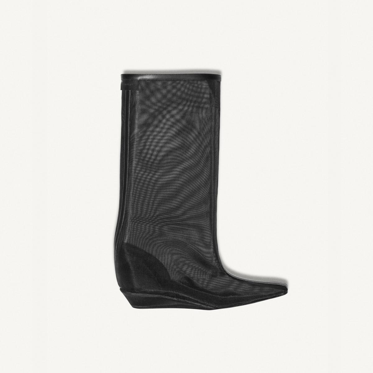 Elegant black mesh boot by Courrèges, perfect for modern fashion enthusiasts.