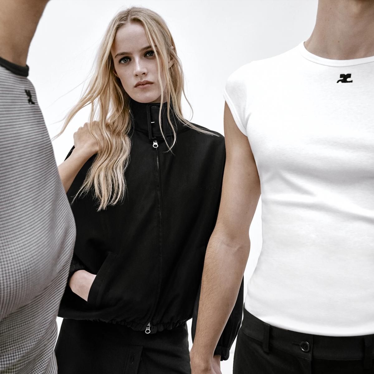 Elegant Courrèges fashion featuring models in stylish black and white clothing for ecommerce.