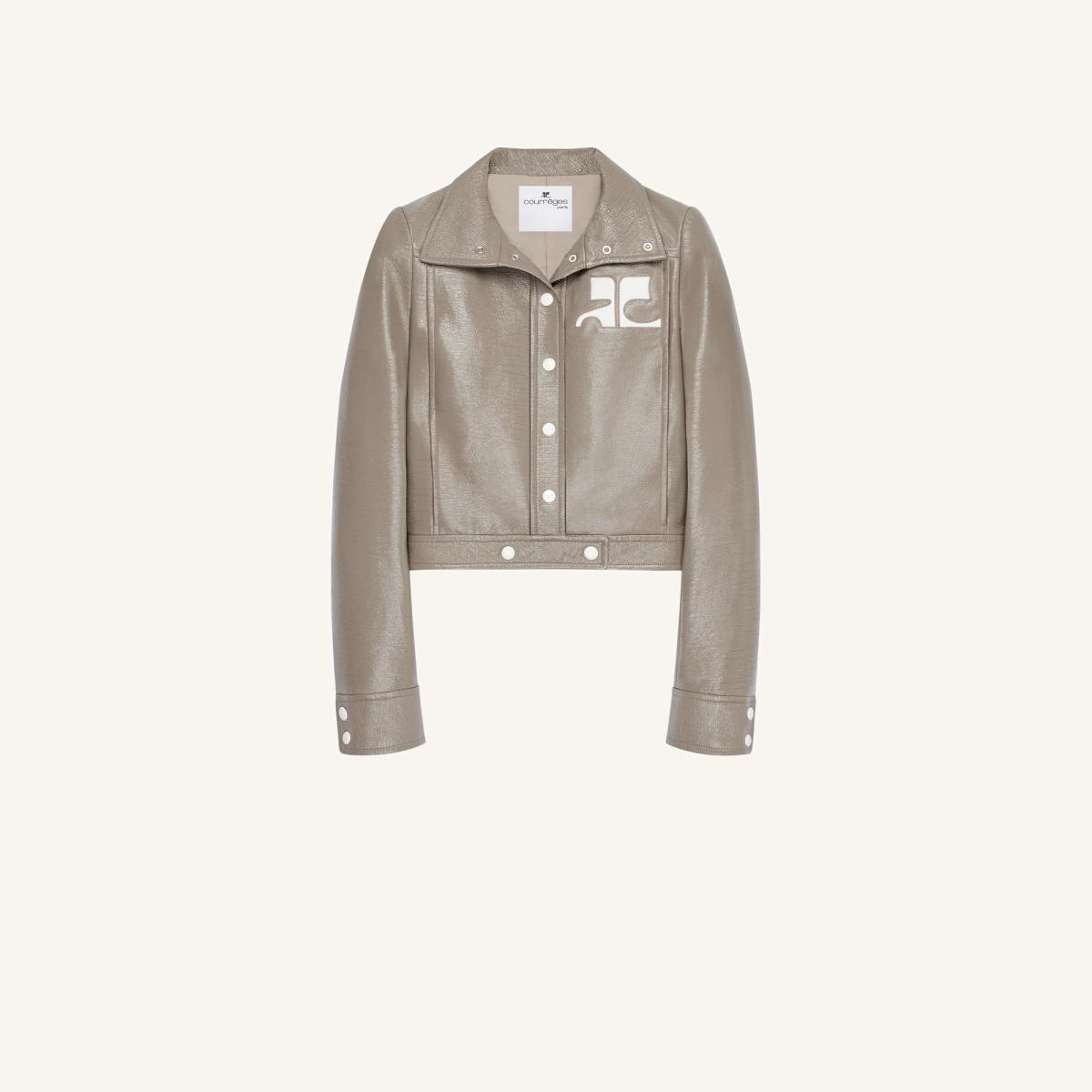 Elegant beige leather jacket by Courrèges for a chic, modern look on an ecommerce site.