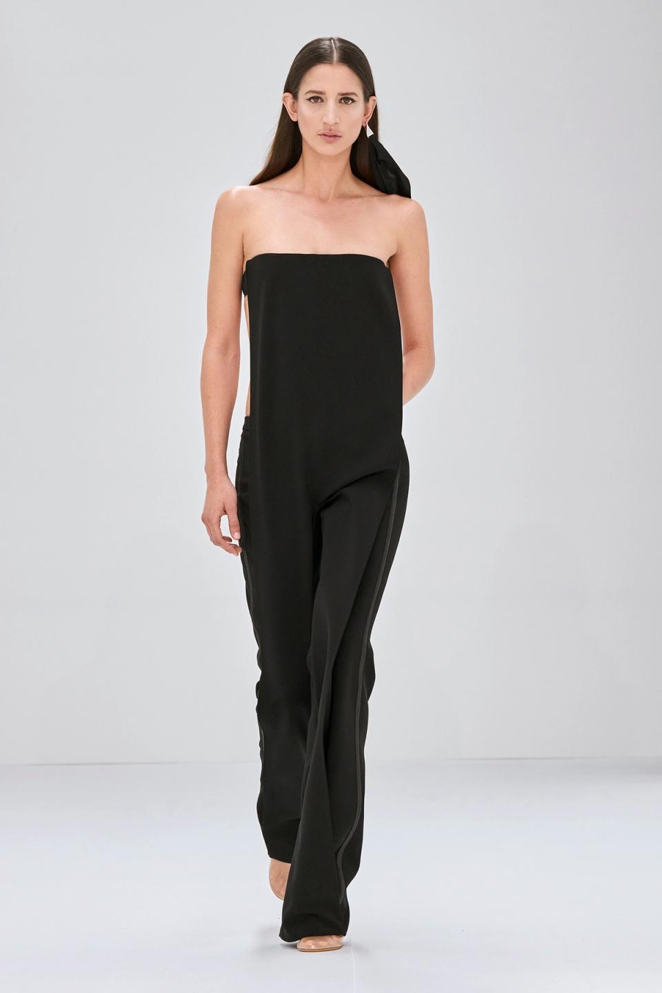 Elegant black strapless jumpsuit from Courrèges, perfect for modern fashion statements.