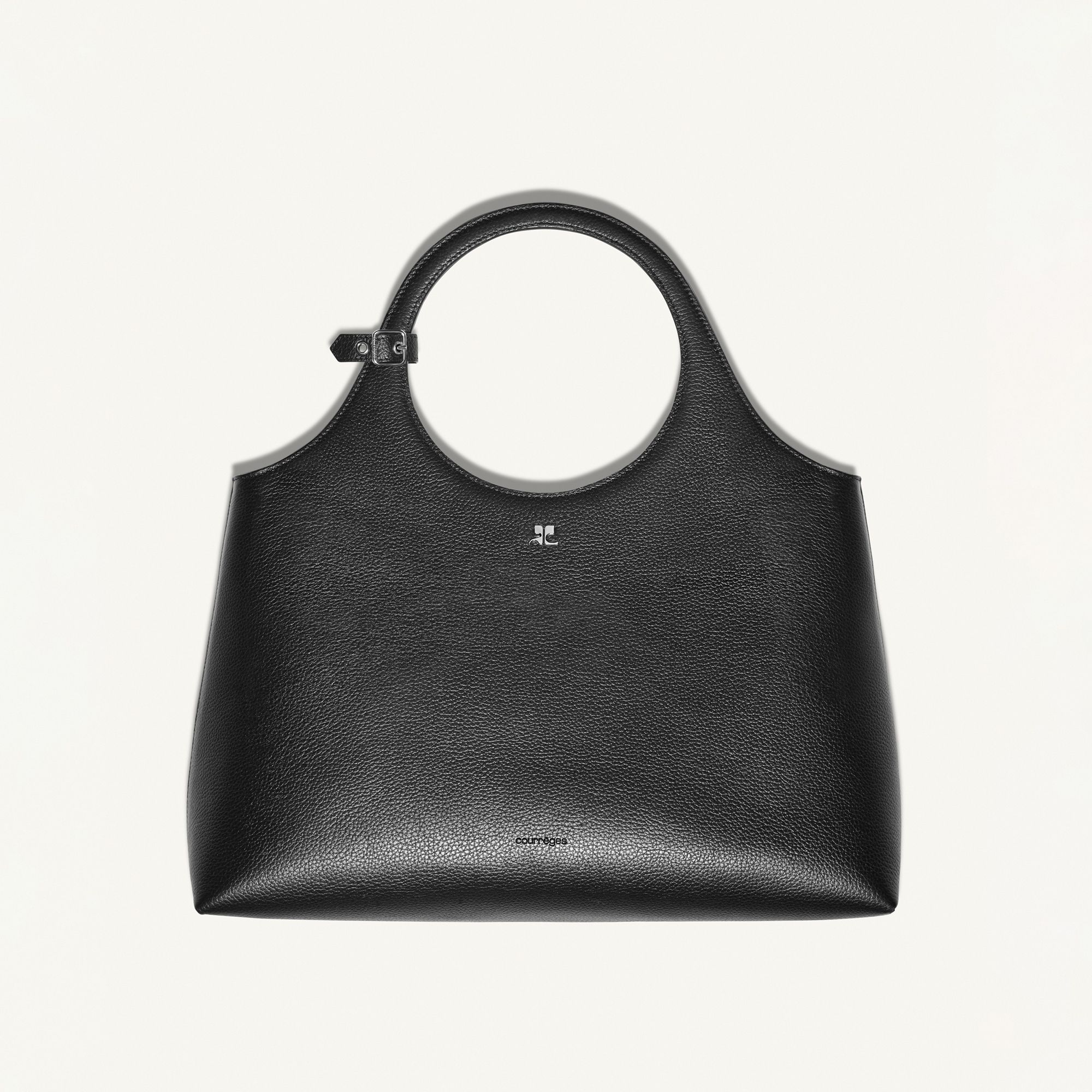 Elegant black leather Courrèges handbag with a circular handle, perfect for modern fashion.