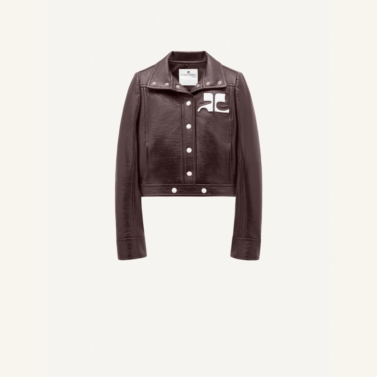 Elegant Courrèges leather jacket with logo patch, perfect for modern fashion statements.