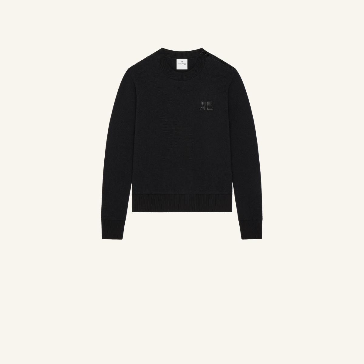 Elegant black Courrèges sweater with subtle logo, perfect for fashion-forward ecommerce shoppers.