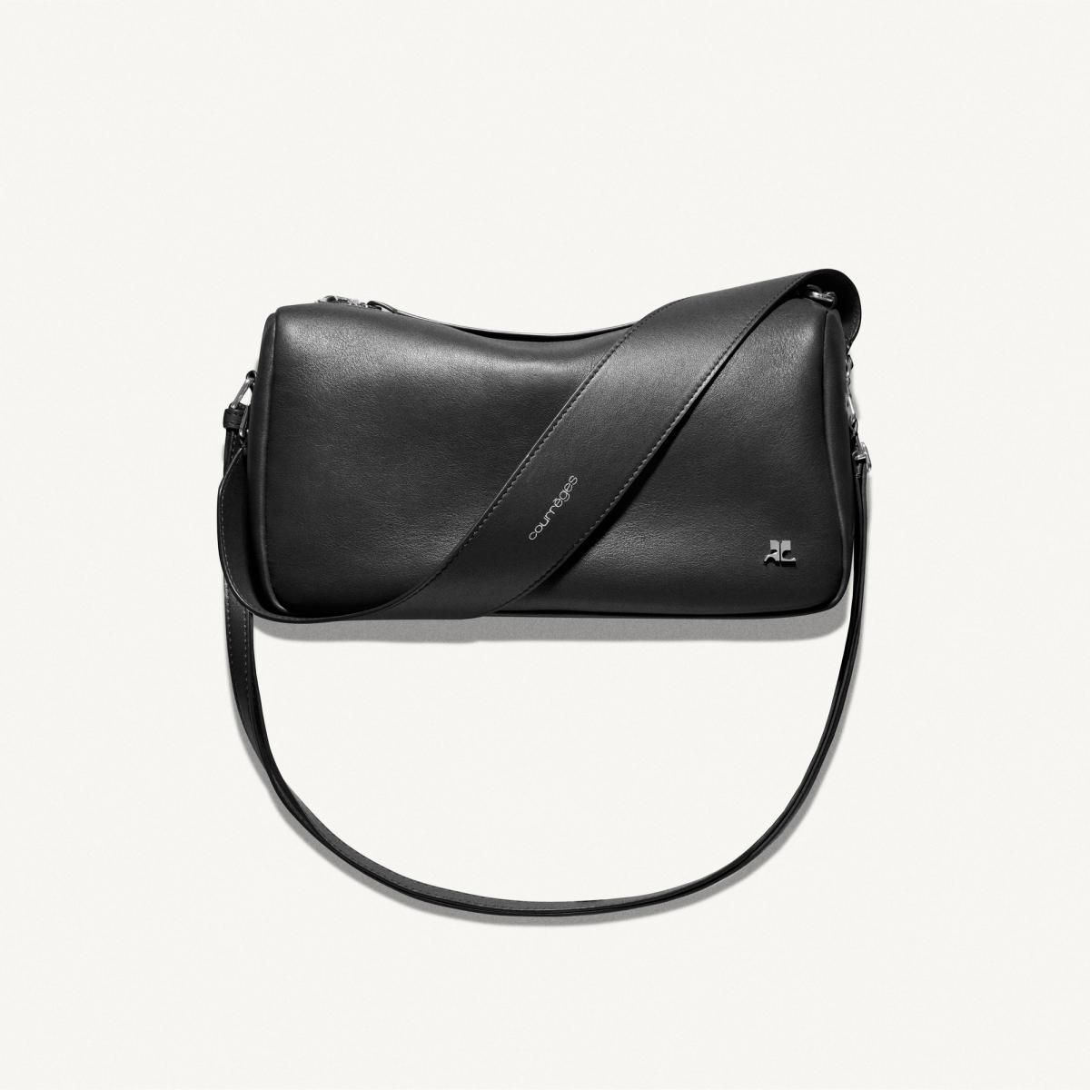 Elegant black leather Courrèges bag with minimalist design for modern fashion accessories.