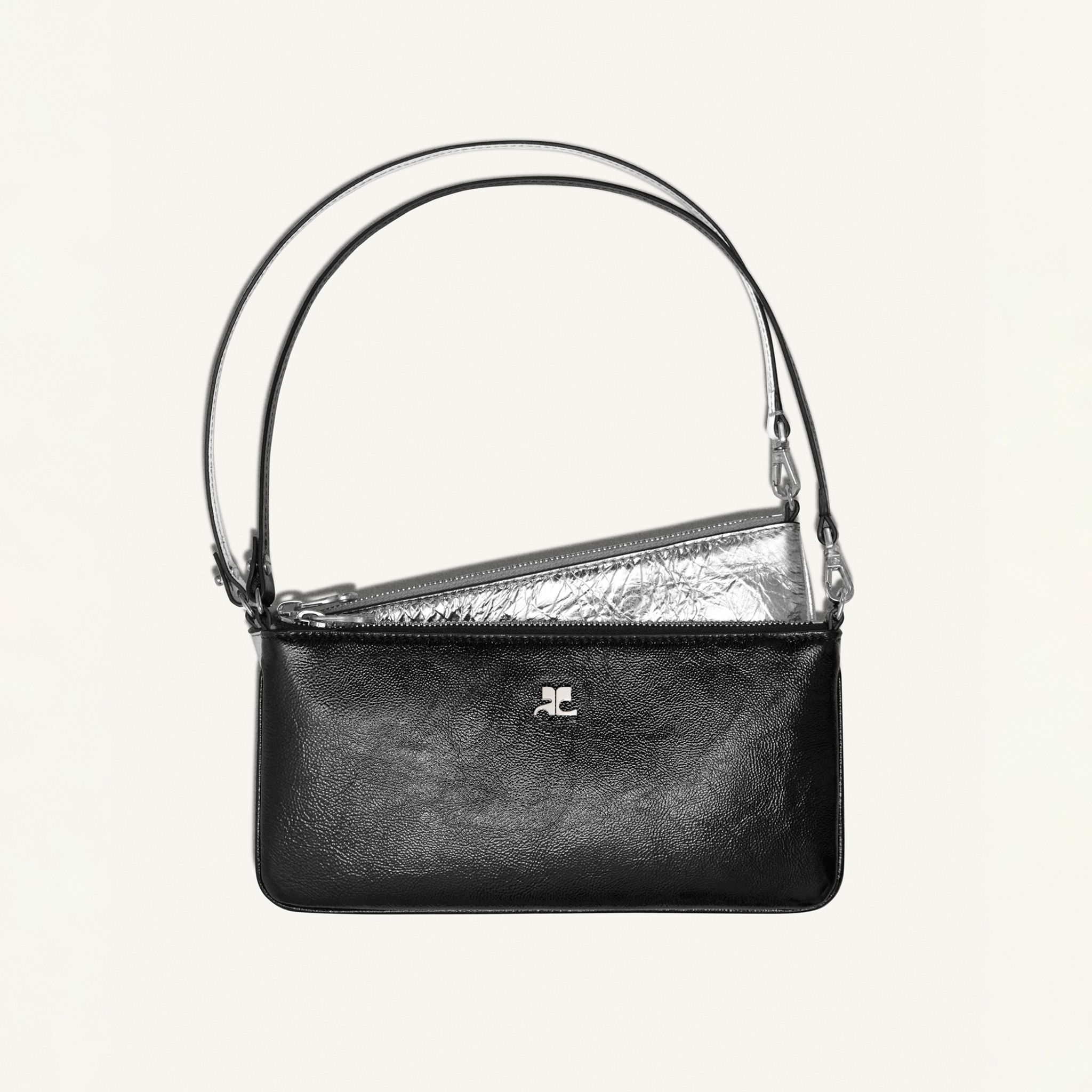 Elegant Courrèges black leather shoulder bag with silver accents, perfect for fashion-forward looks.