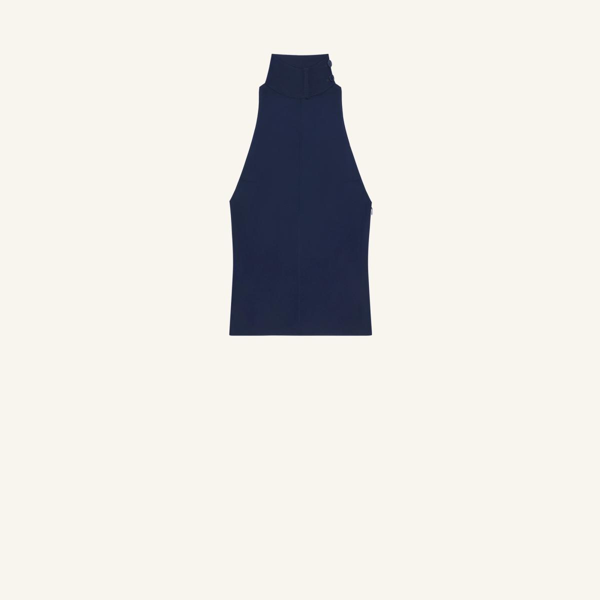 Elegant navy blue sleeveless dress with high collar, perfect for Courrèges fashion collection.