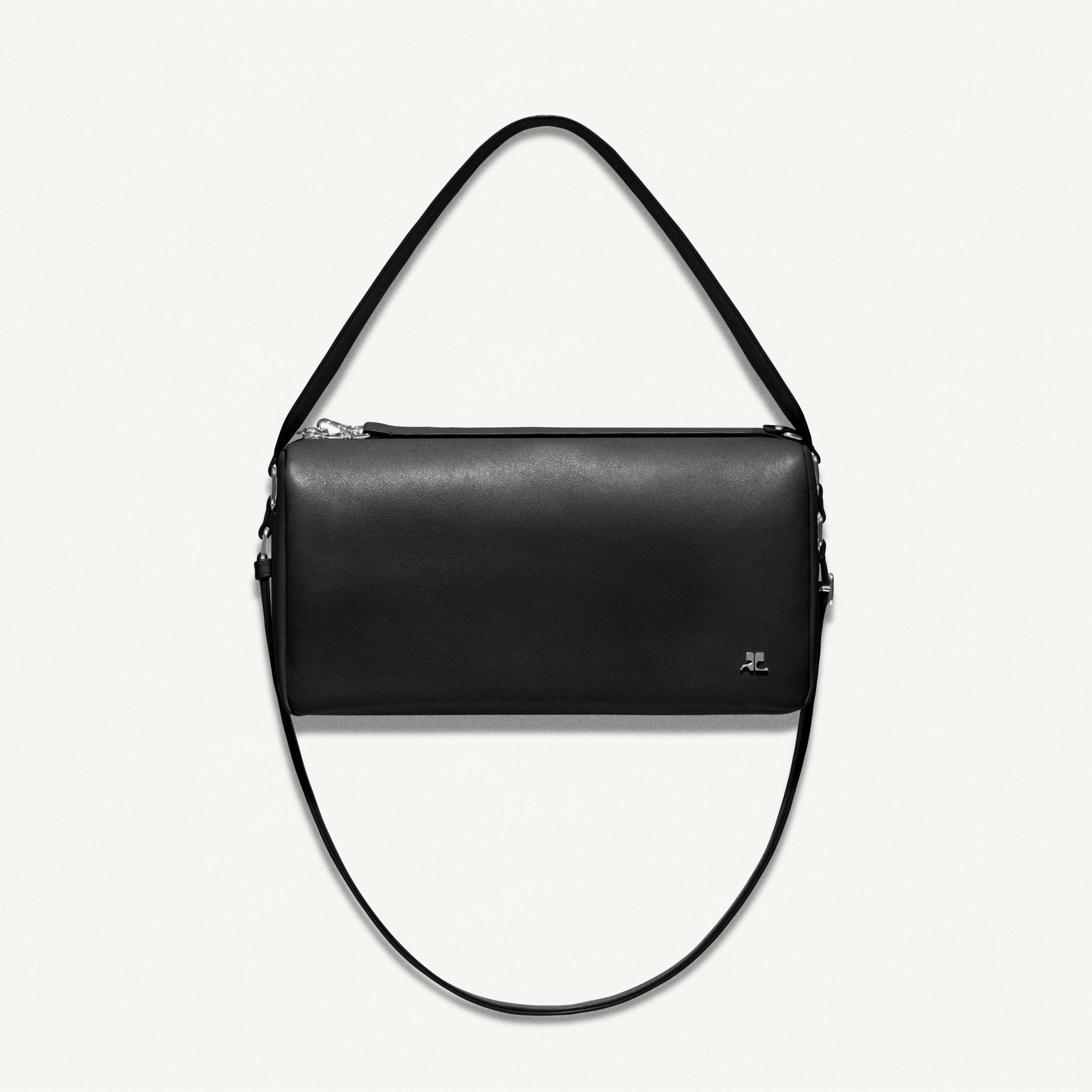 Elegant black leather bag with adjustable strap, Courrèges fashion accessory for women.
