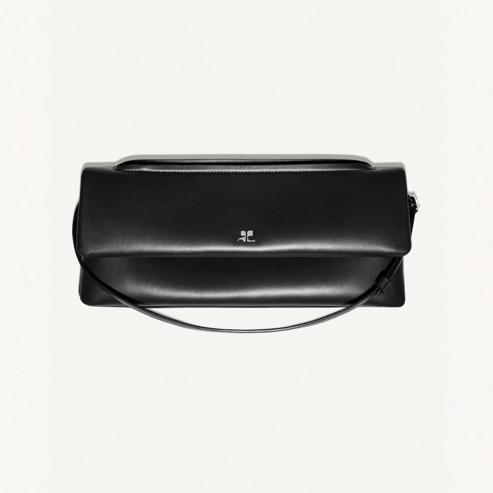 Elegant black leather handbag with minimalist design, perfect for Courrèges fashion statement.