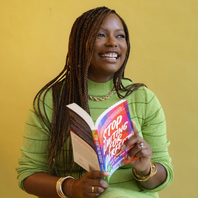 L'Oreal Thompson Payton holding her book