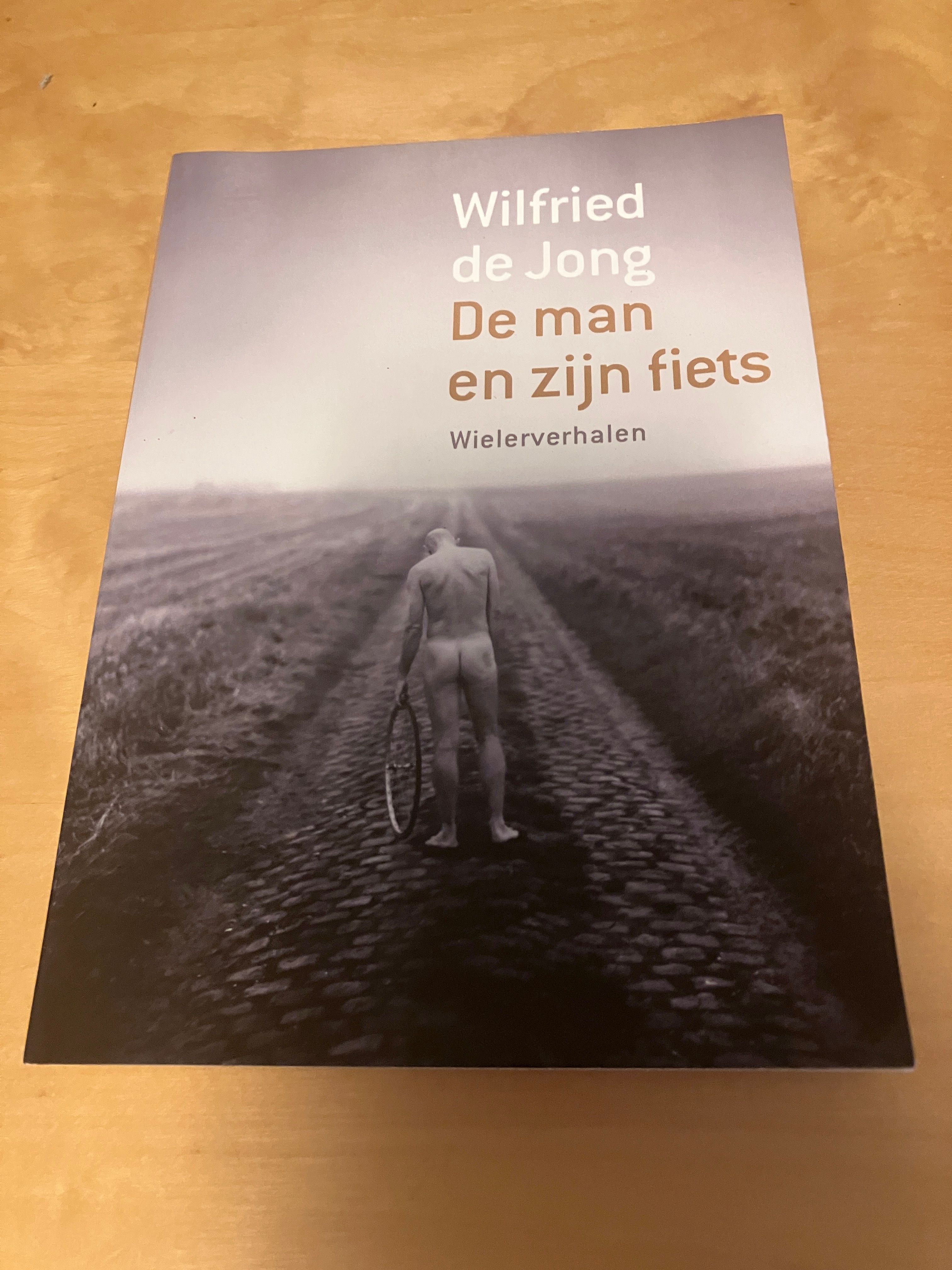 De man en zijn fiets