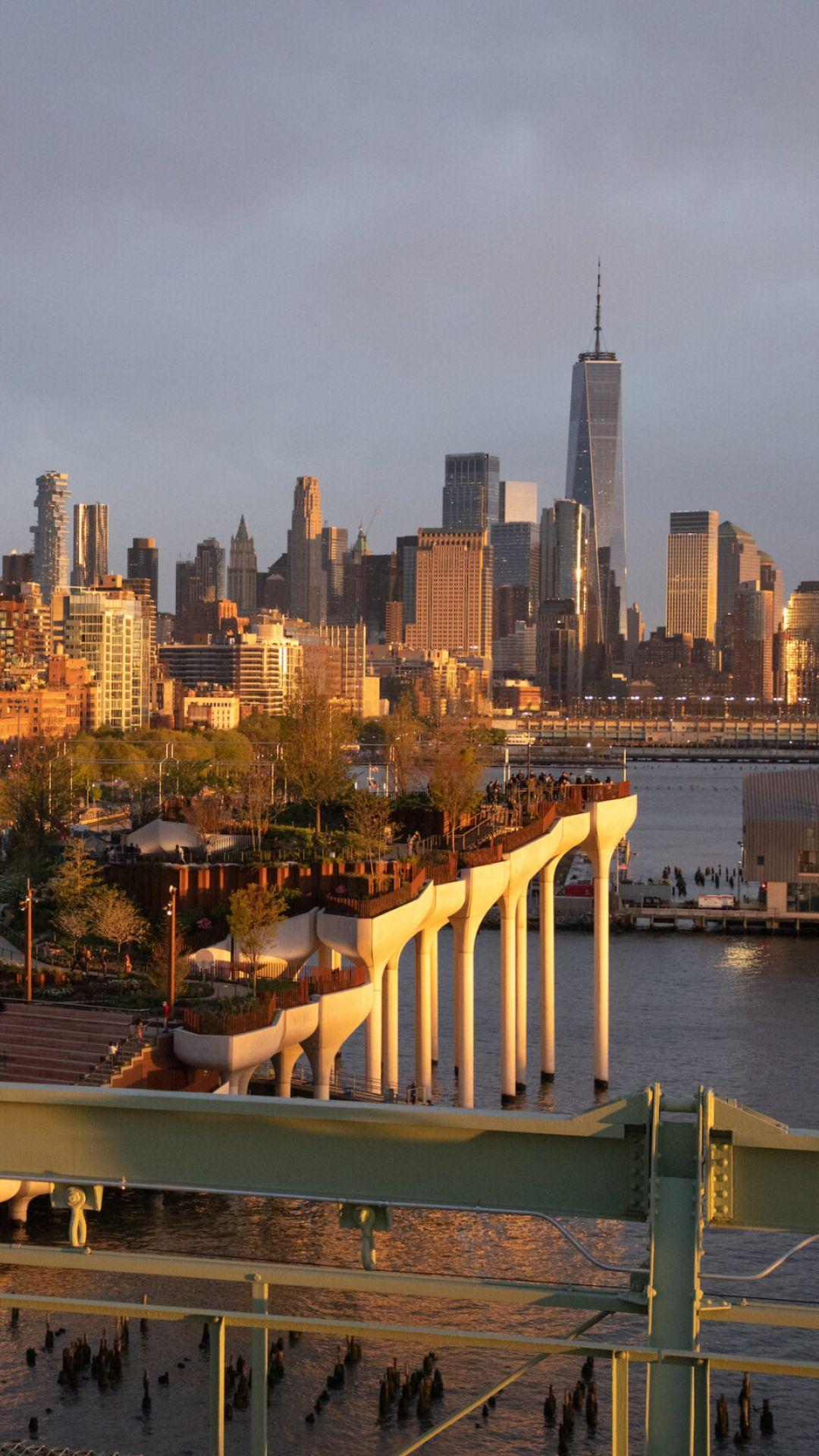 Lower Manhattan and Little Island at golden hour, New York