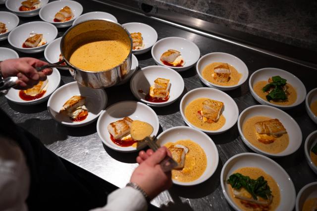 Sauce poured over the fish course at the Taste of Iceland dinner