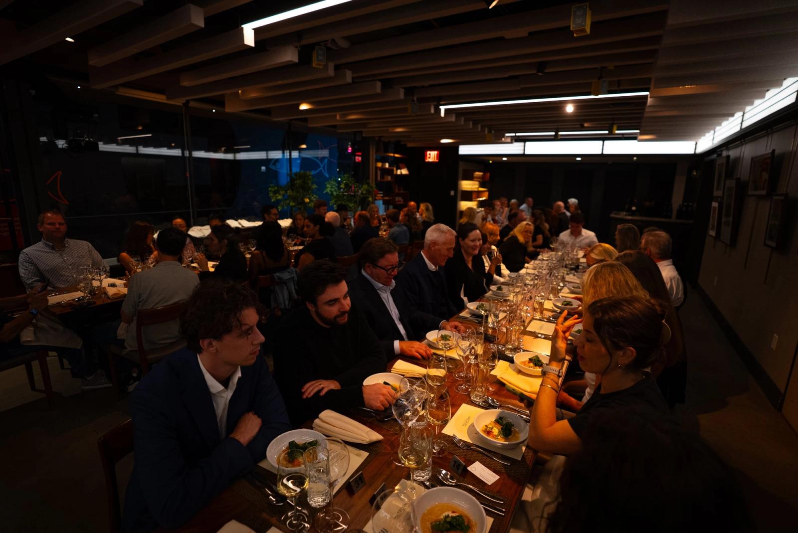 Guests along the long table at the Taste of Iceland dinner in New York