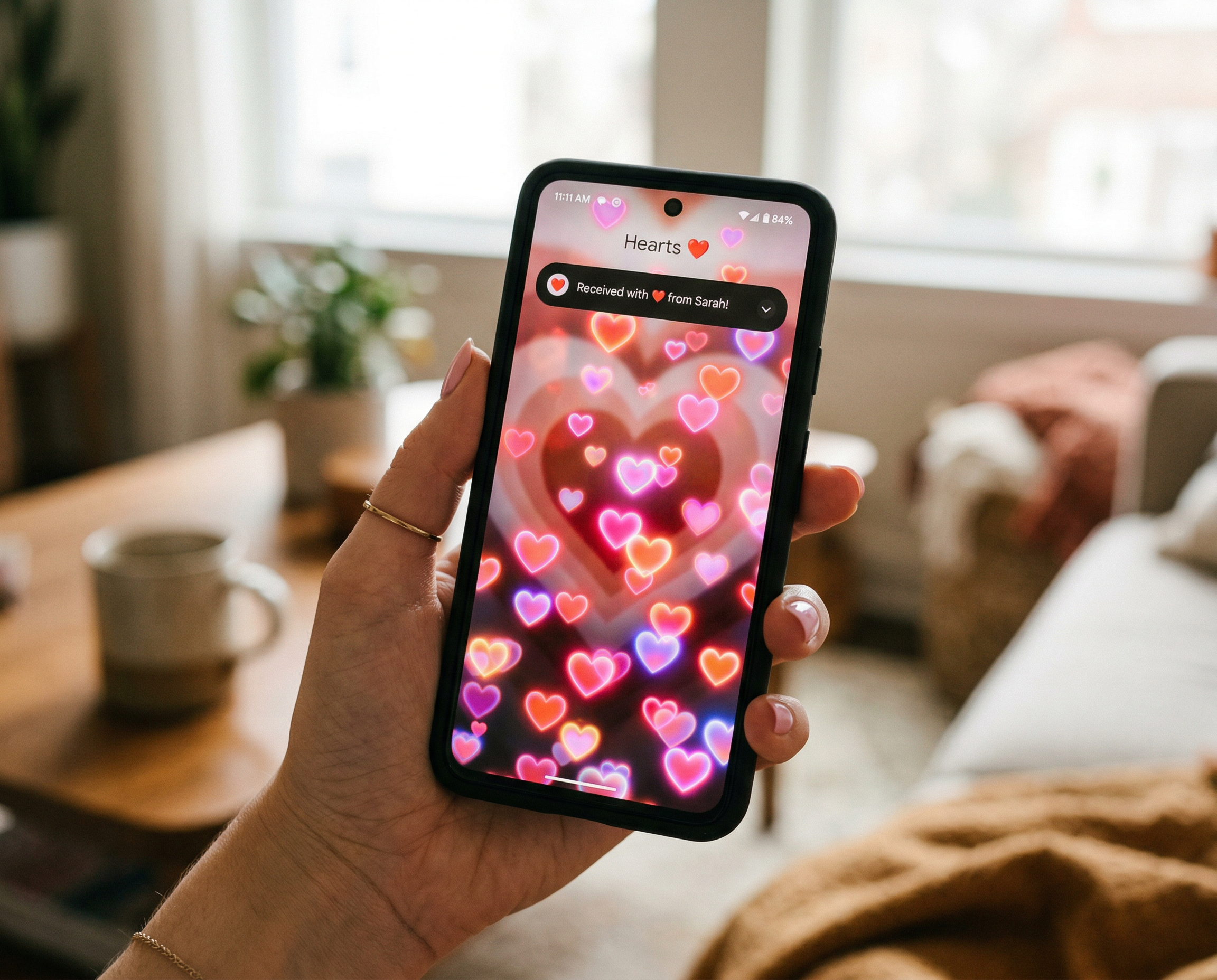 Phone showing digital hearts.